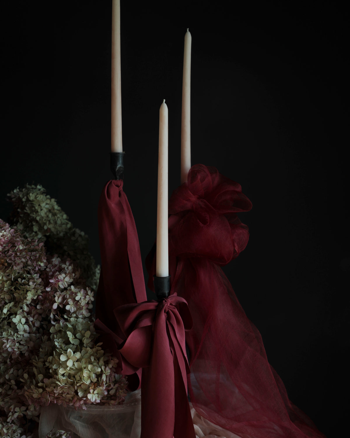 red wedding theme tablescape design for wedding table with red ribbon details