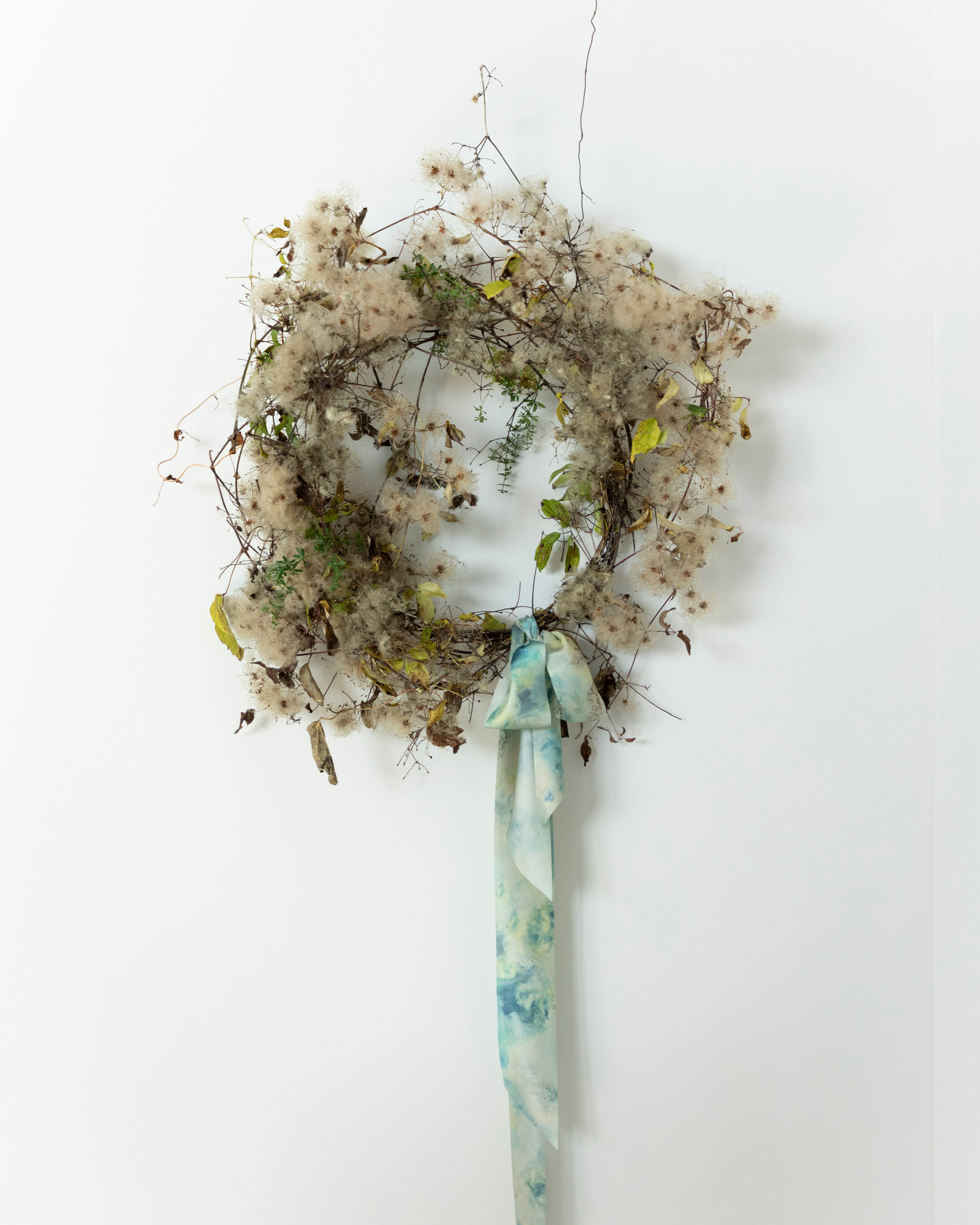 wild dried wreath with silk ribbon bow. Eco-friendly silk ribbons with nature-inspired patterns, perfect for unique gift wrapping and tying market bouquets, crafted from sustainable materials