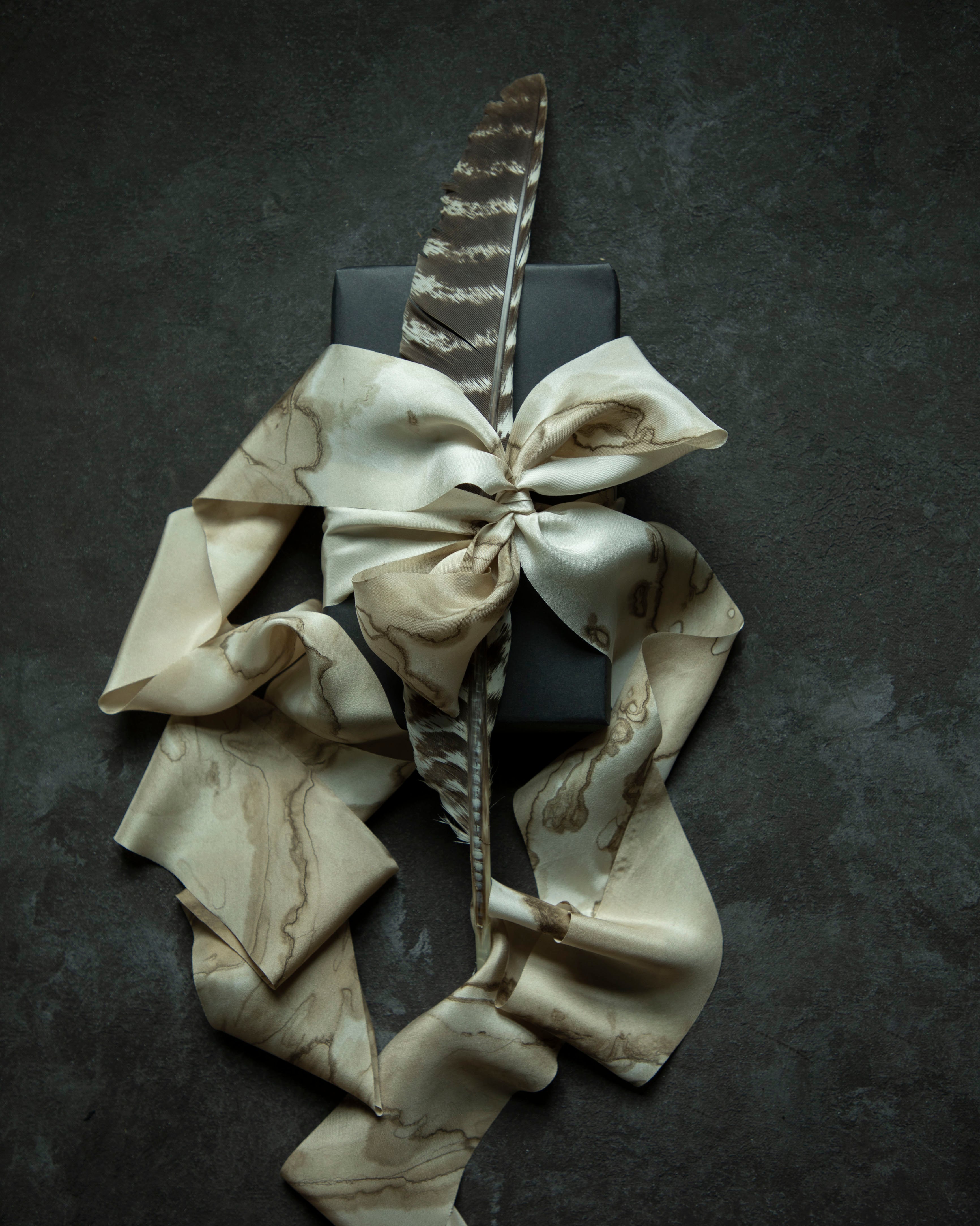 luxury gifting wrapping with silk and willow woodgrain walnut silk ribbons. Gift wrapping ideas for men.