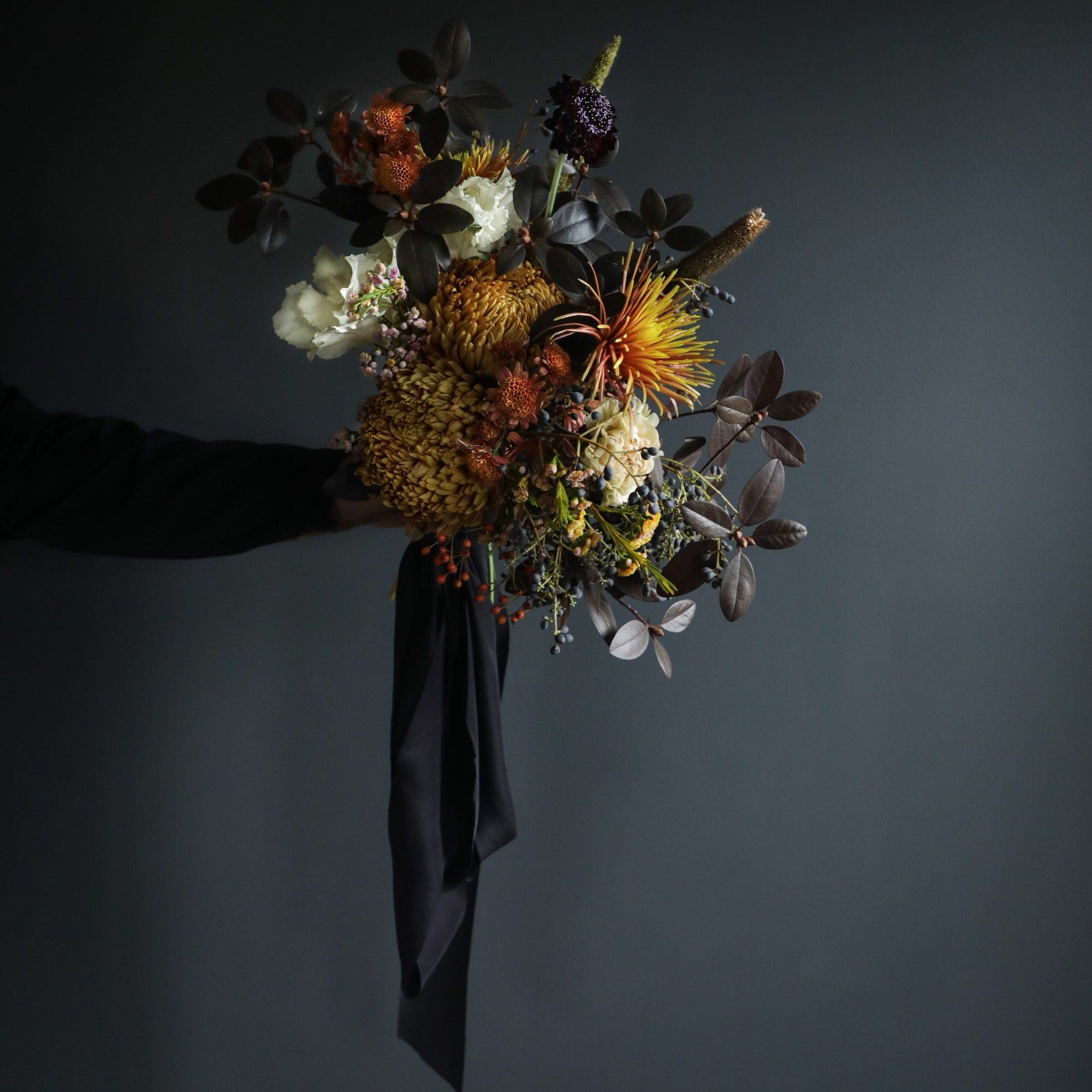 bridal bouquet with black silk ribbons