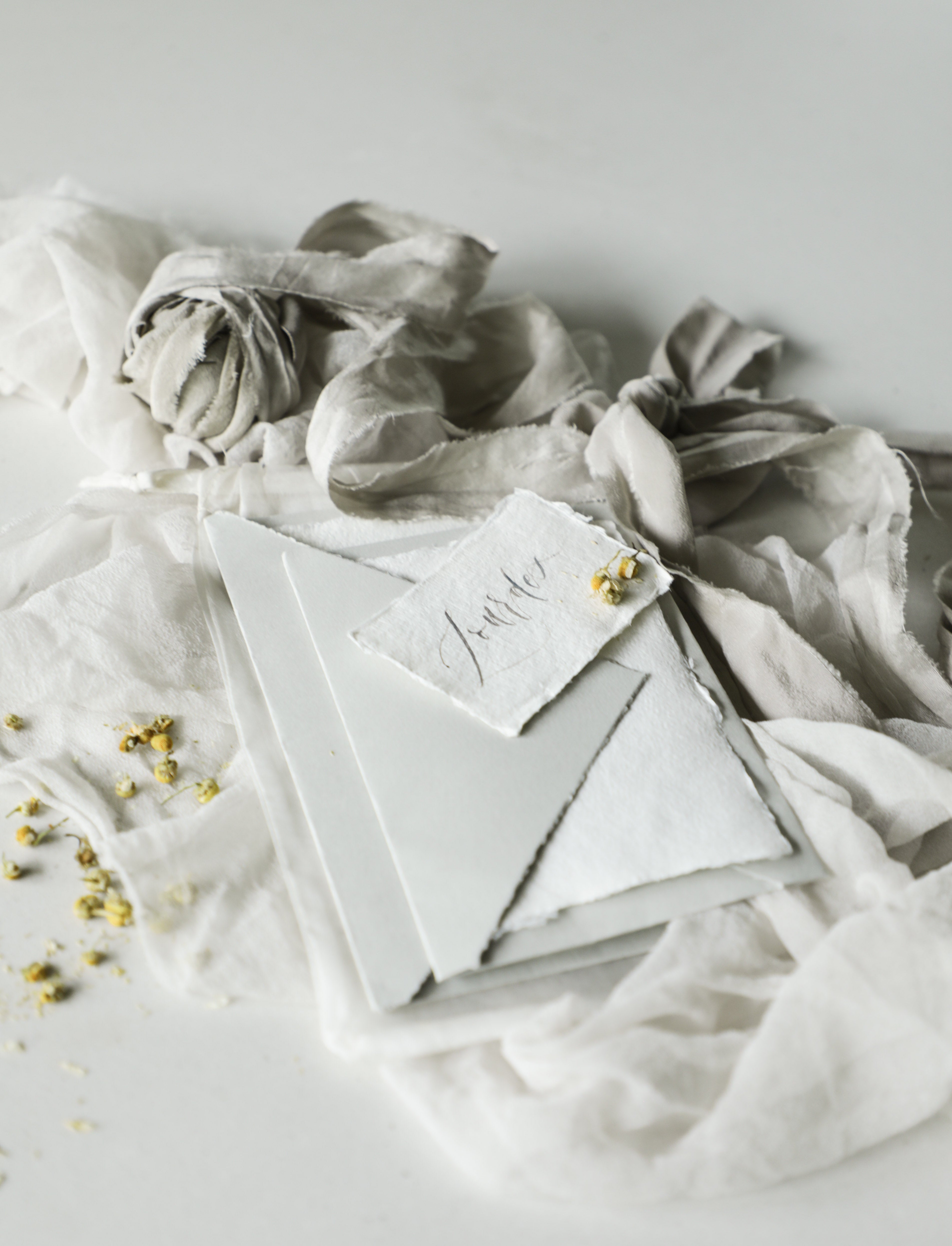 hand calligraphy on handmade deckled edge paper by silk and willow