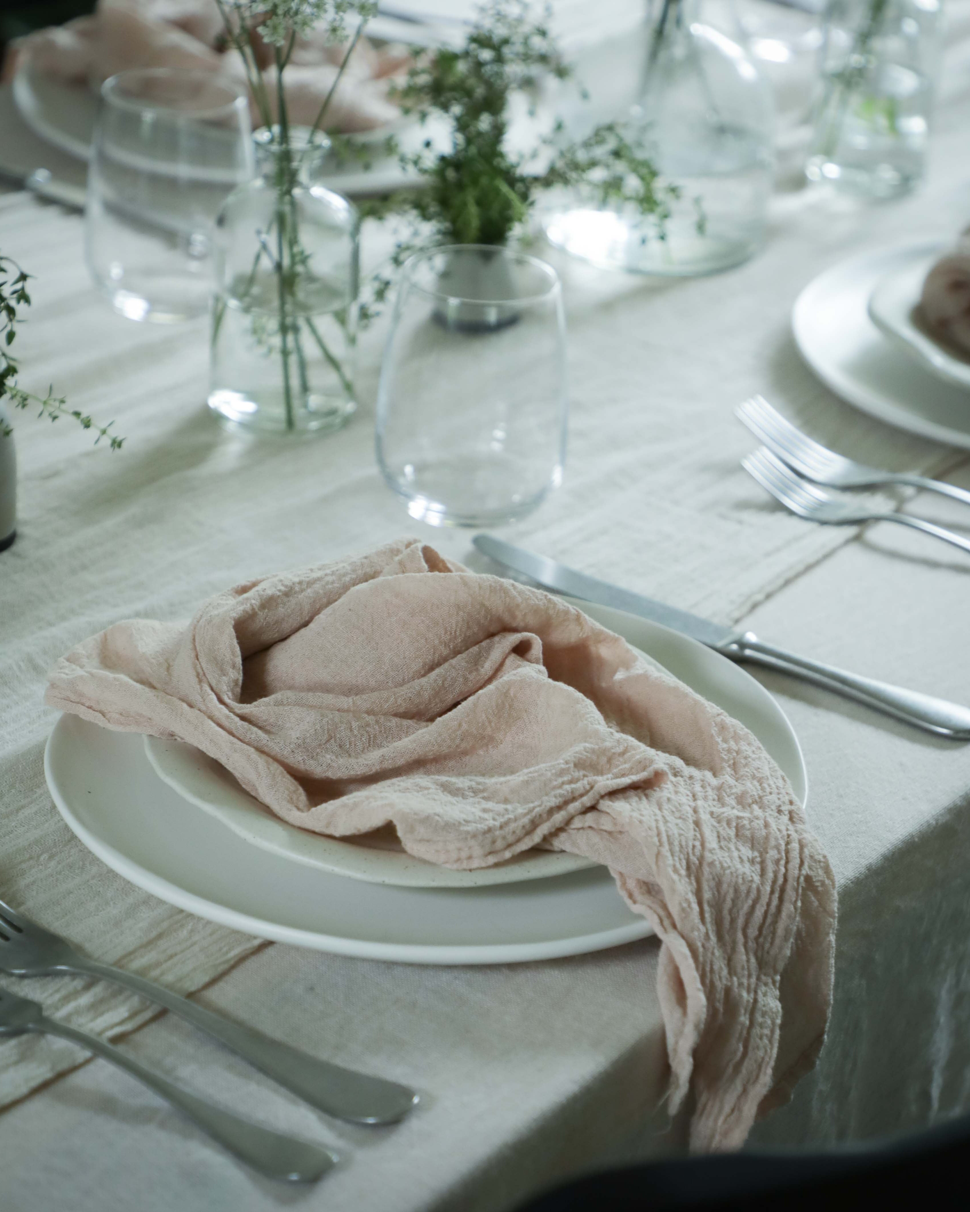 romantic table setting with Silk and Willow plant dyed and hand-loomed napkins in Blush color