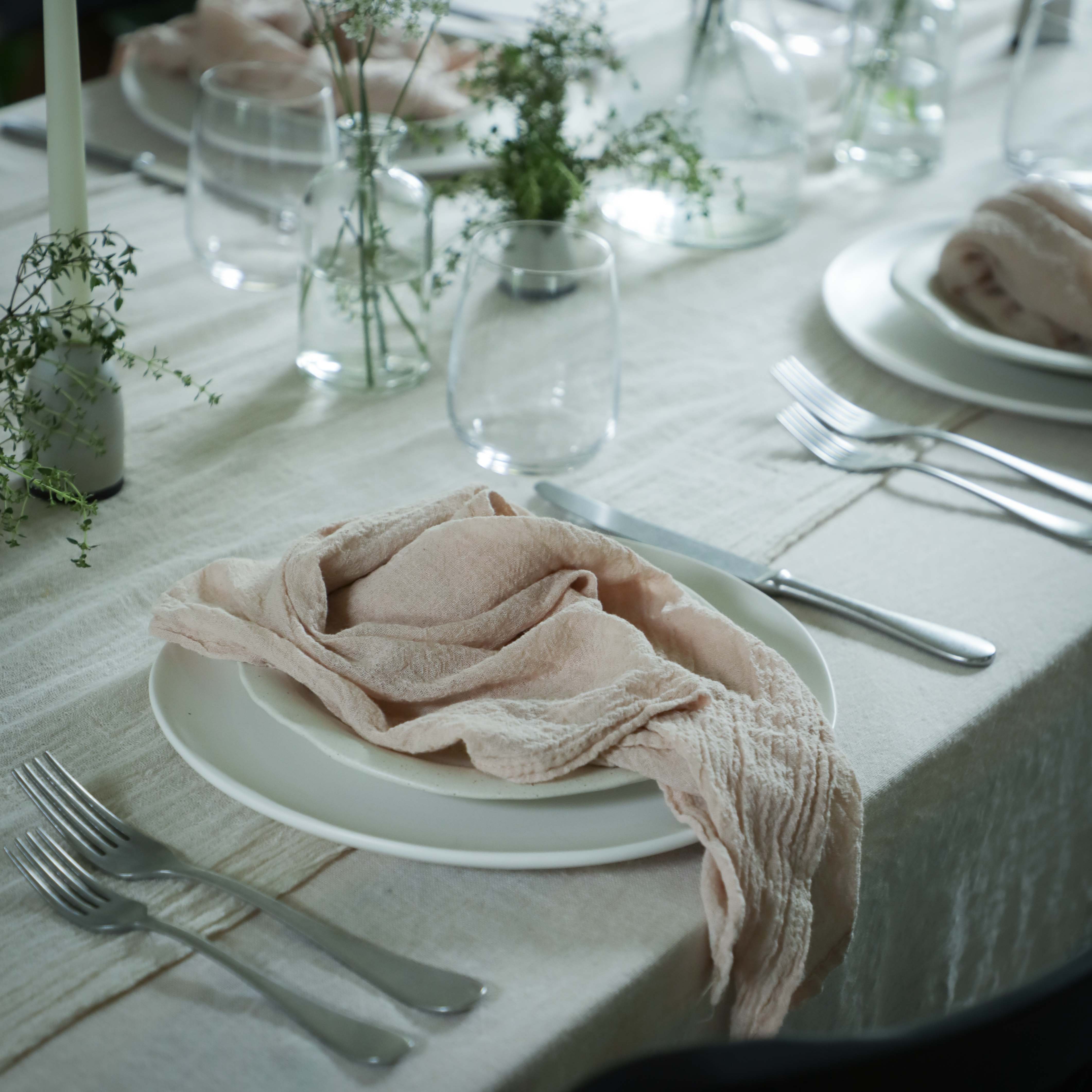 romantic table setting with Silk and Willow plant dyed and hand-loomed napkins in Blush color