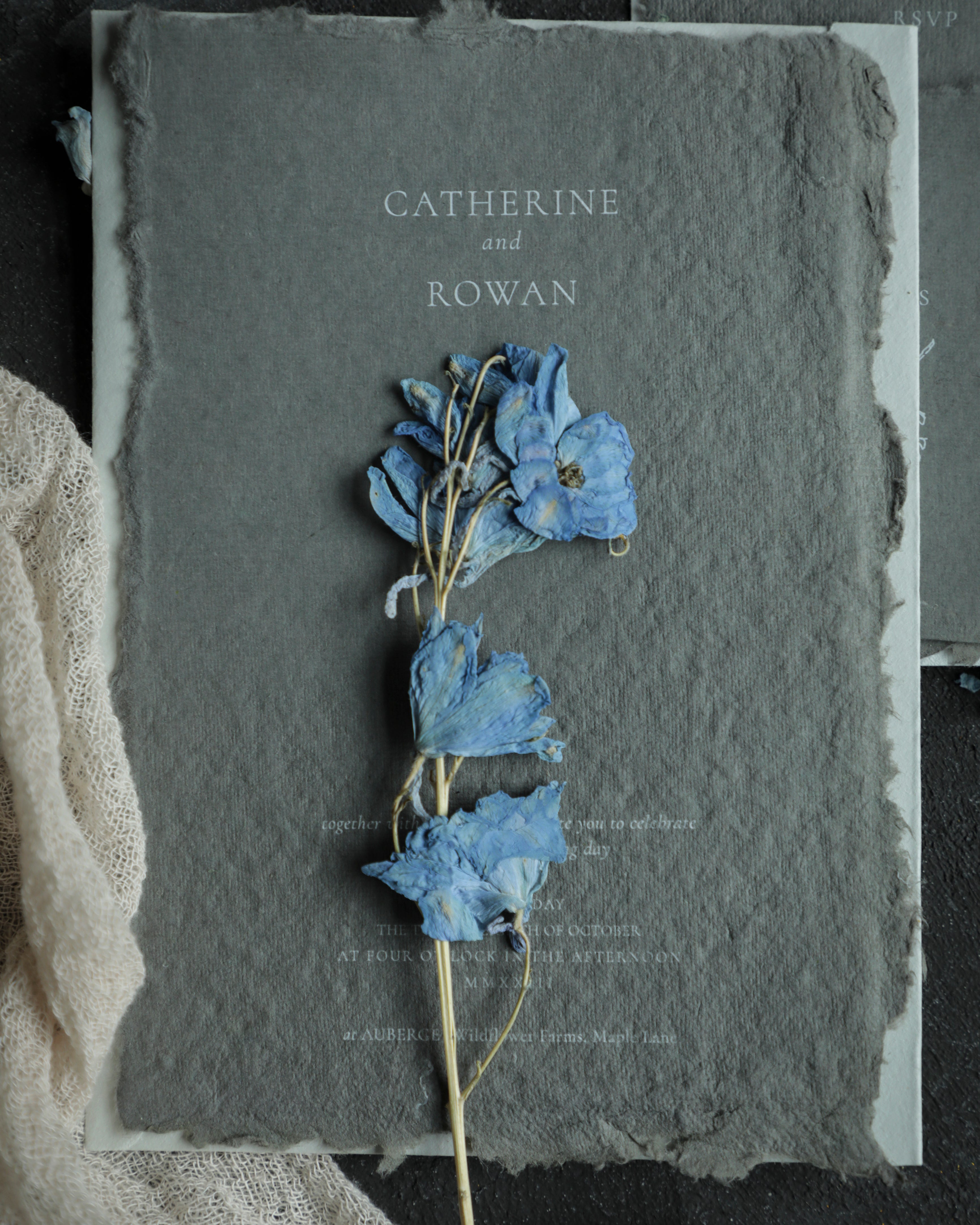 handmade paper by silk and willow with white ink toner