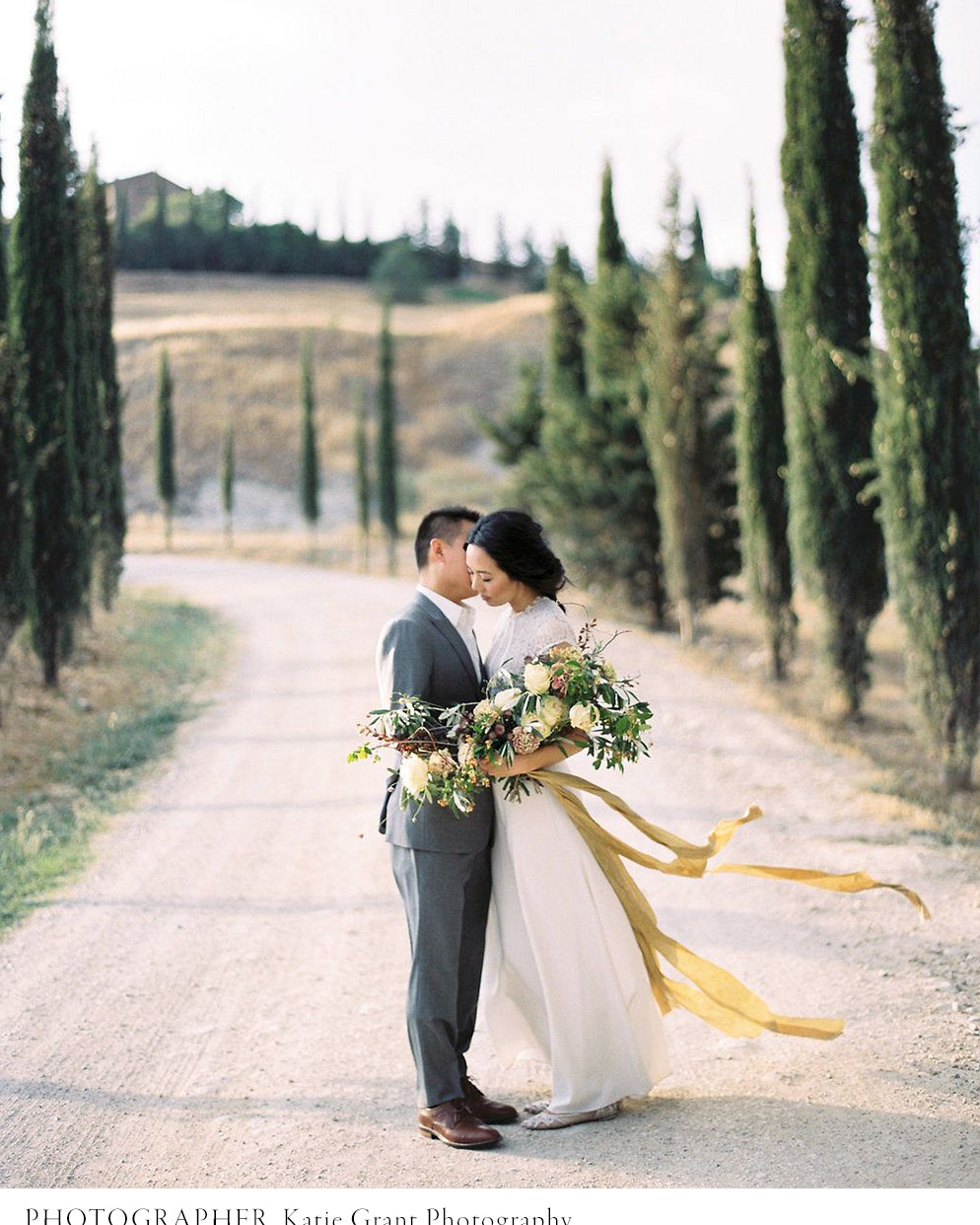 bride and groom in italy with bridal bouquet ied with Silk & Willow hand crafted gold silk ribbon