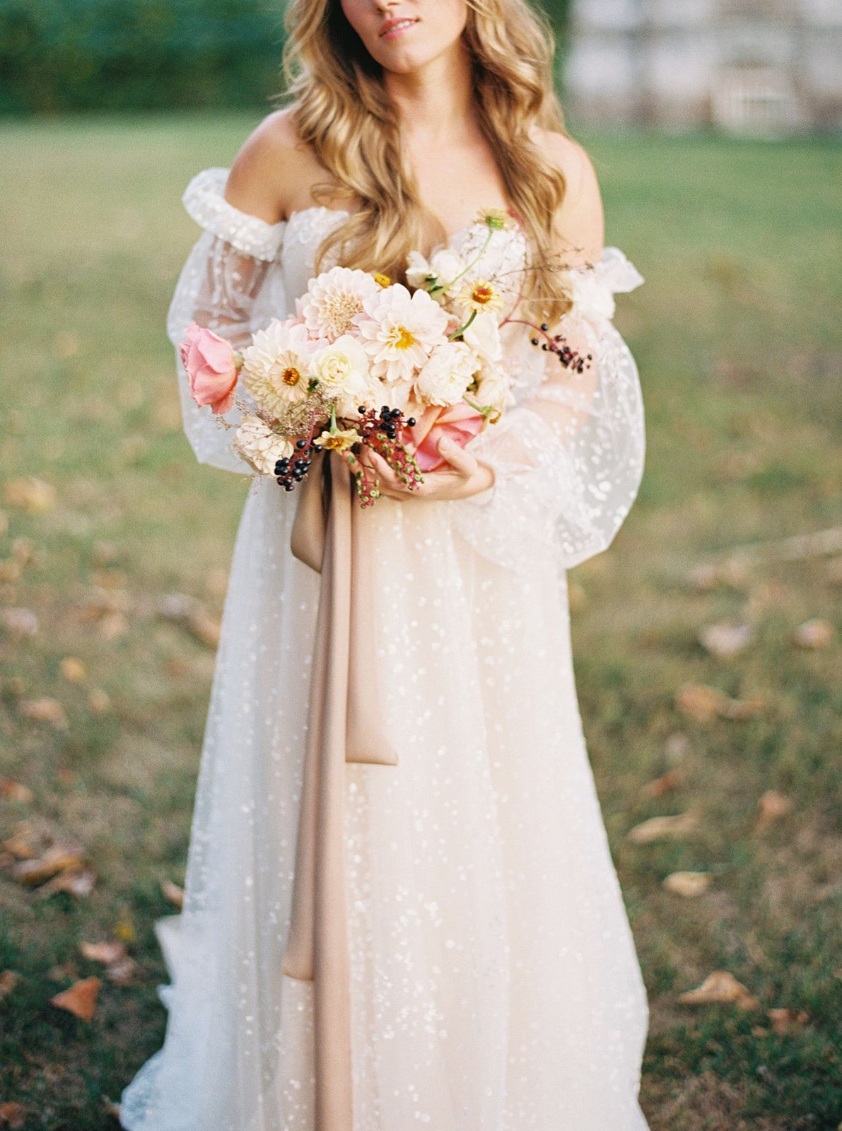 WEDDING SPARROW | A Puff Sleeved Gown with Fall Flowers