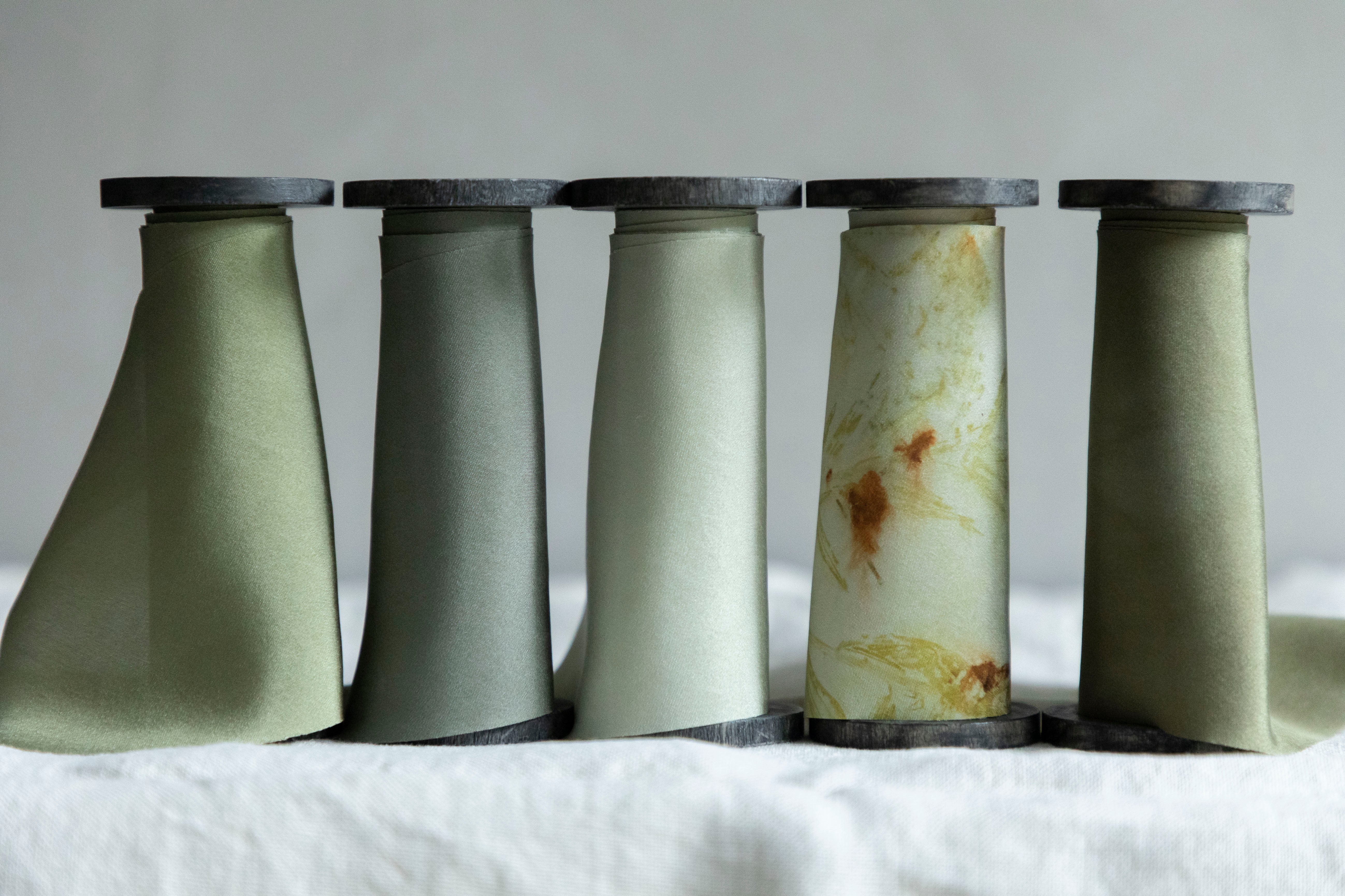 A Collection of Plant Dyed Silk Ribbon in Green Hues for the Holiday Season