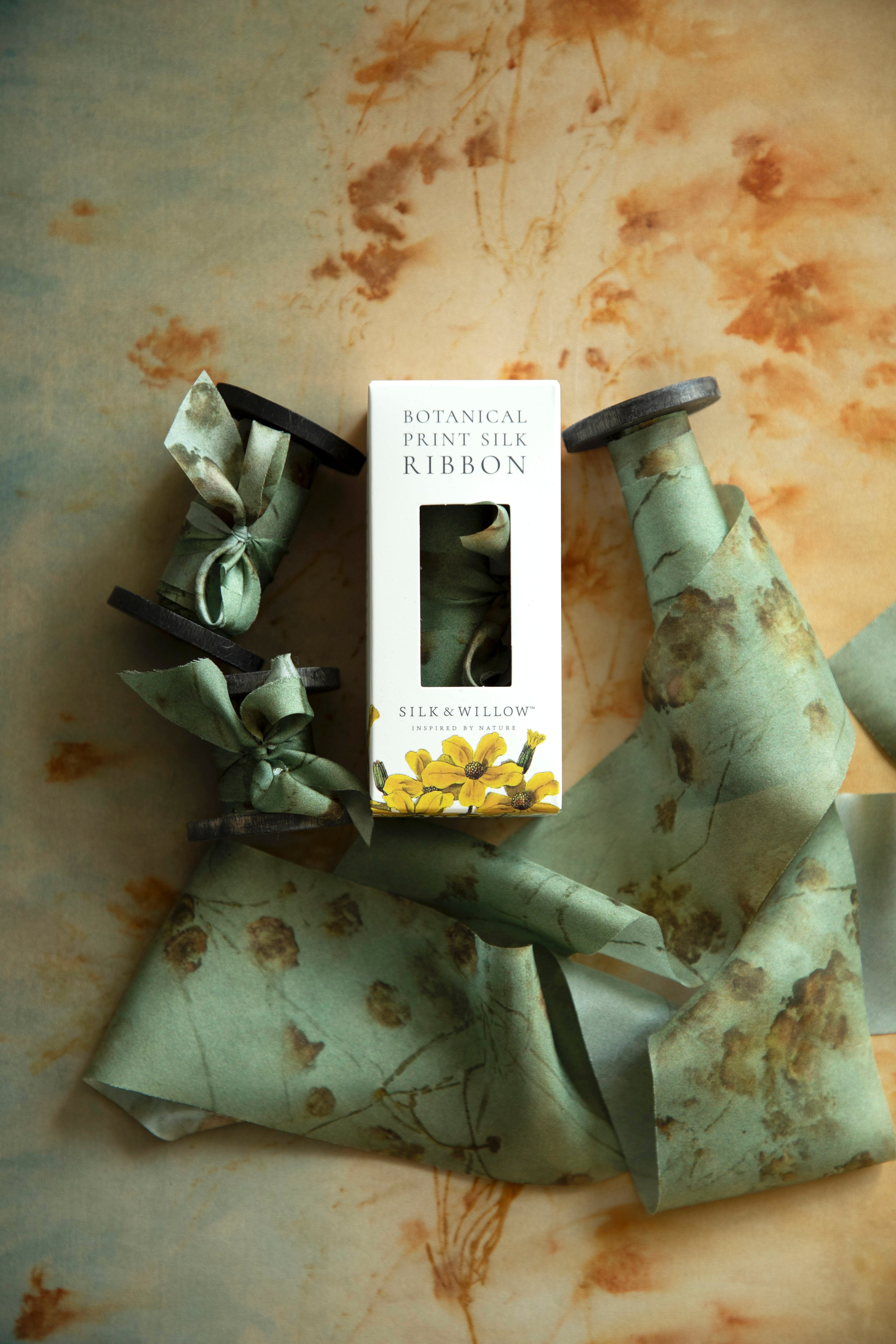 Eco-friendly silk ribbons with nature-inspired patterns, perfect for unique gift wrapping and tying market bouquets, crafted from sustainable materials