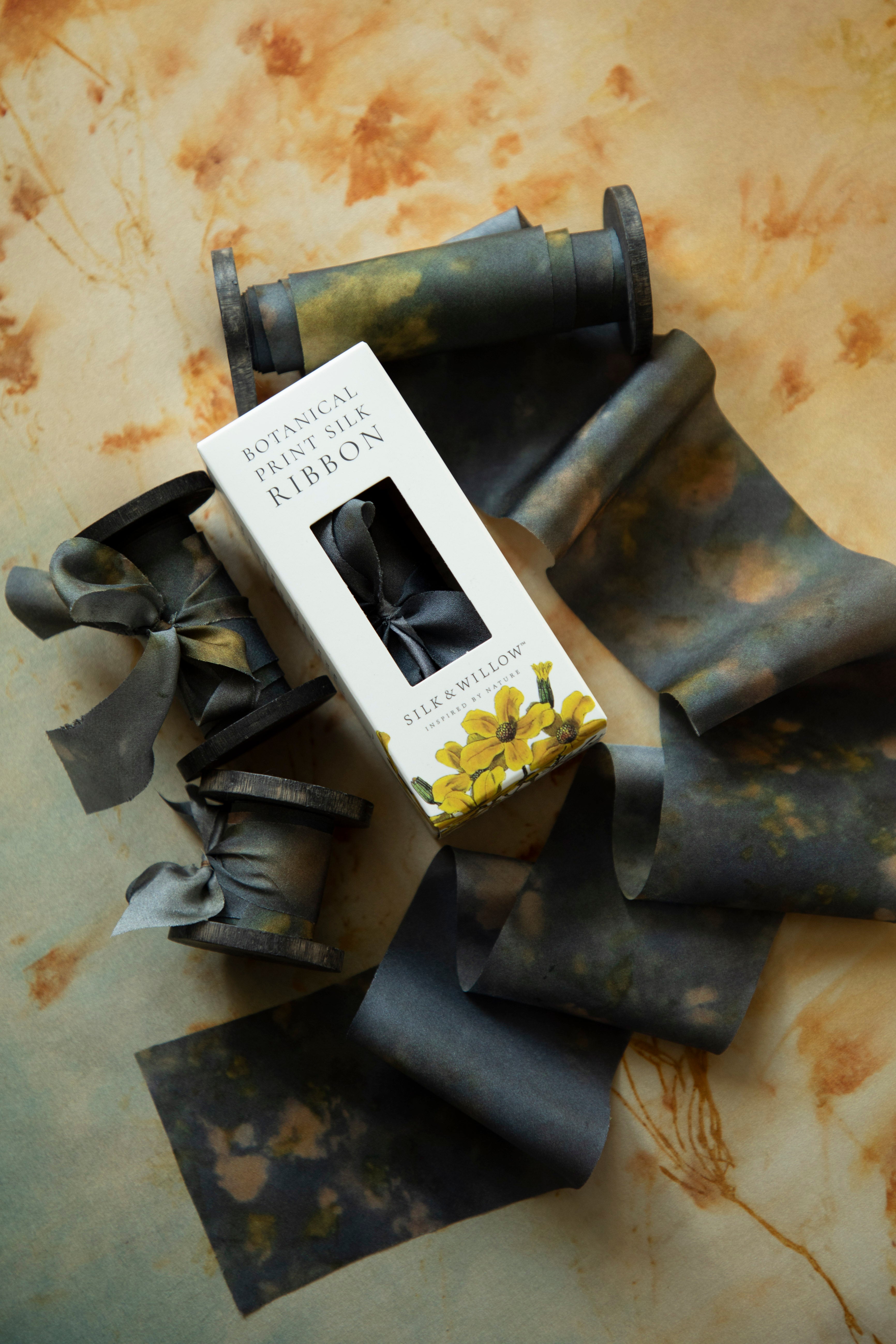 Eco-friendly silk ribbons with nature-inspired patterns, perfect for unique gift wrapping and tying market bouquets, crafted from sustainable materials