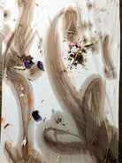 Abstract art with brown and beige brush strokes on a white background