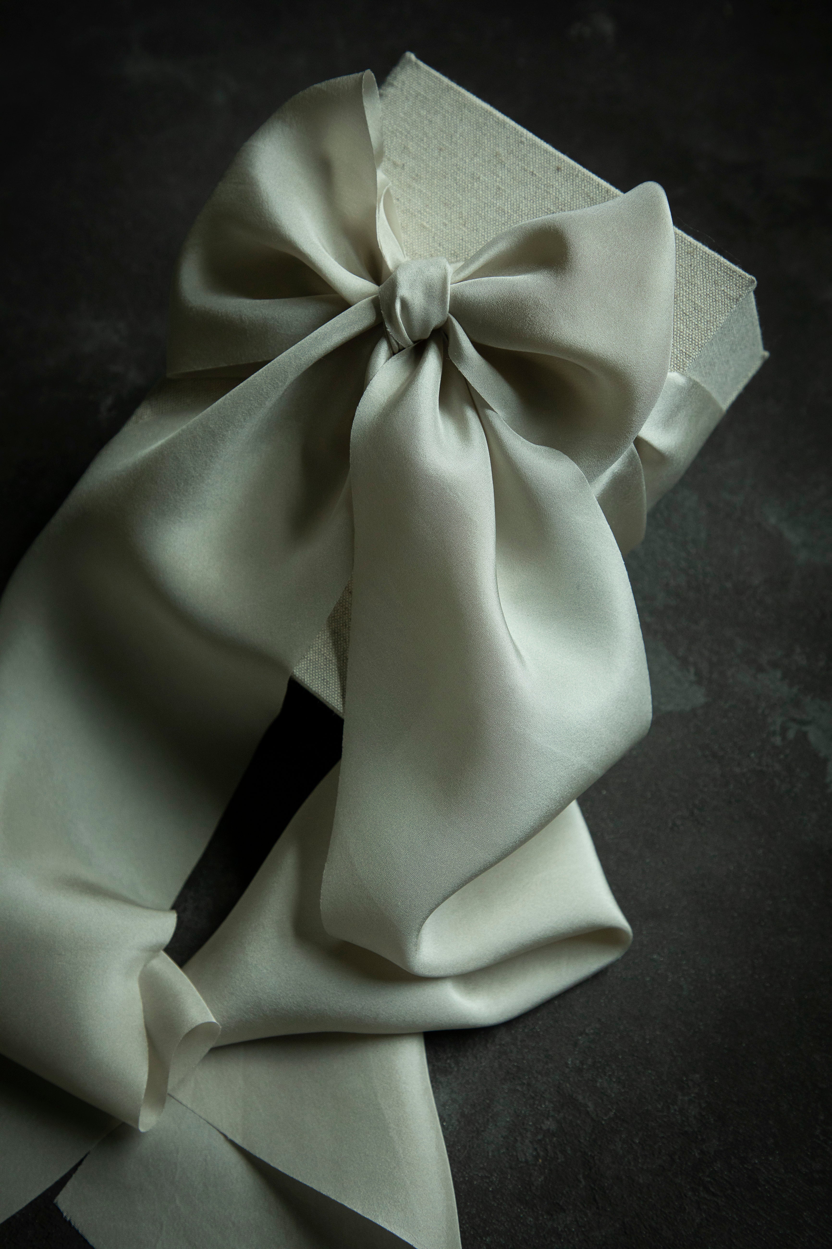 White bow on a dark background