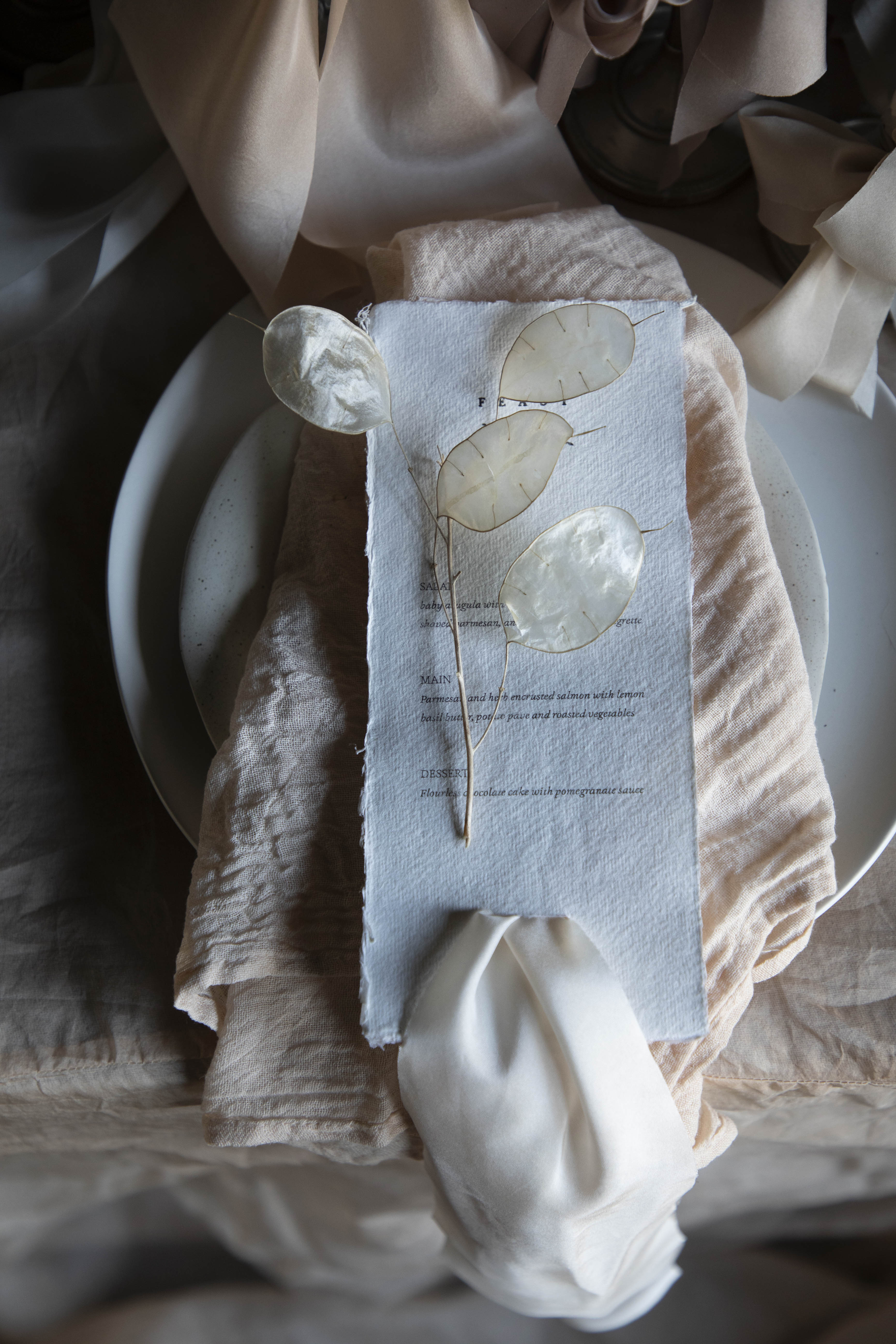 Decorative napkin with floral design on a table setting