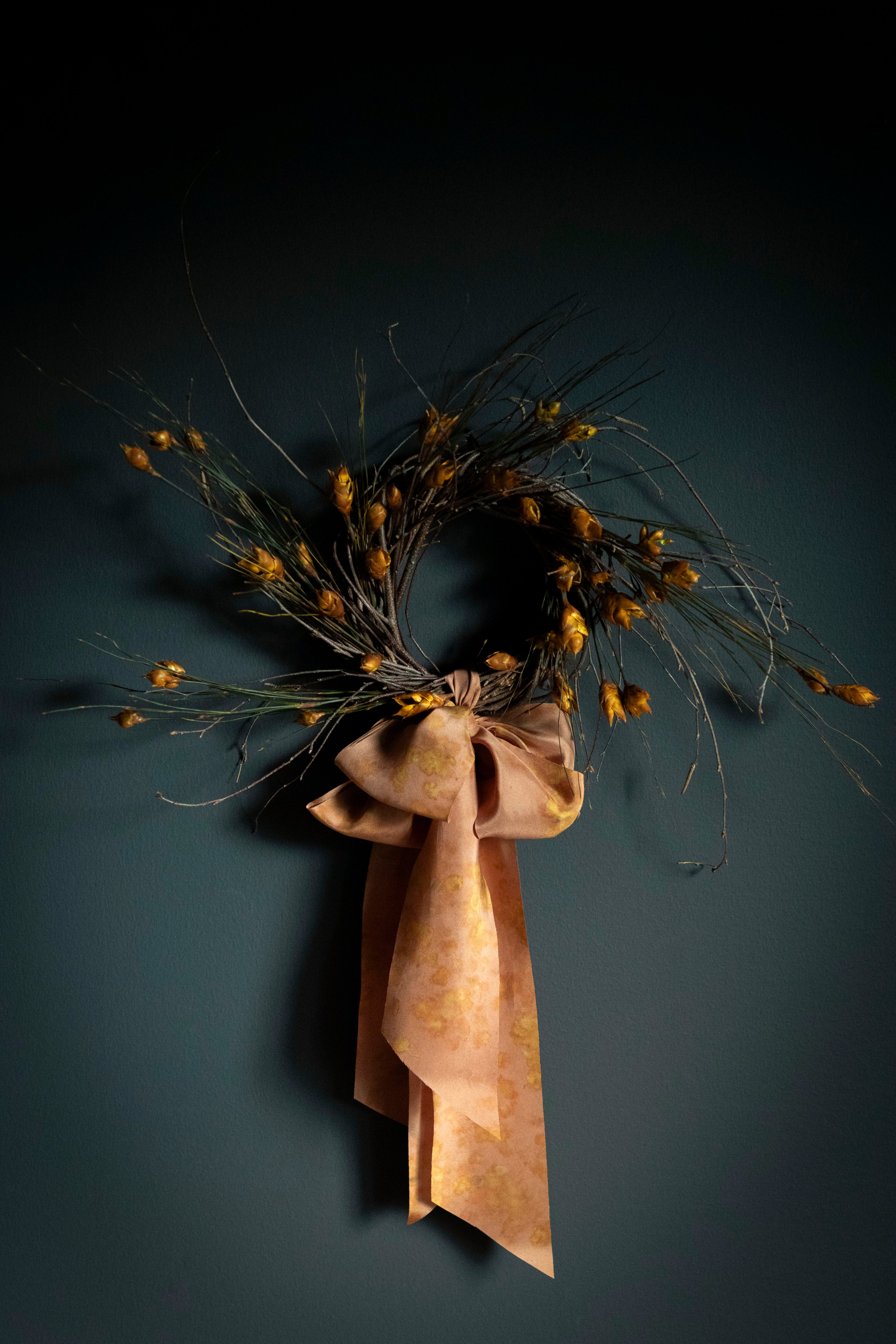 Hand crafted wreath with dried flowers and hand dyed silk ribbon