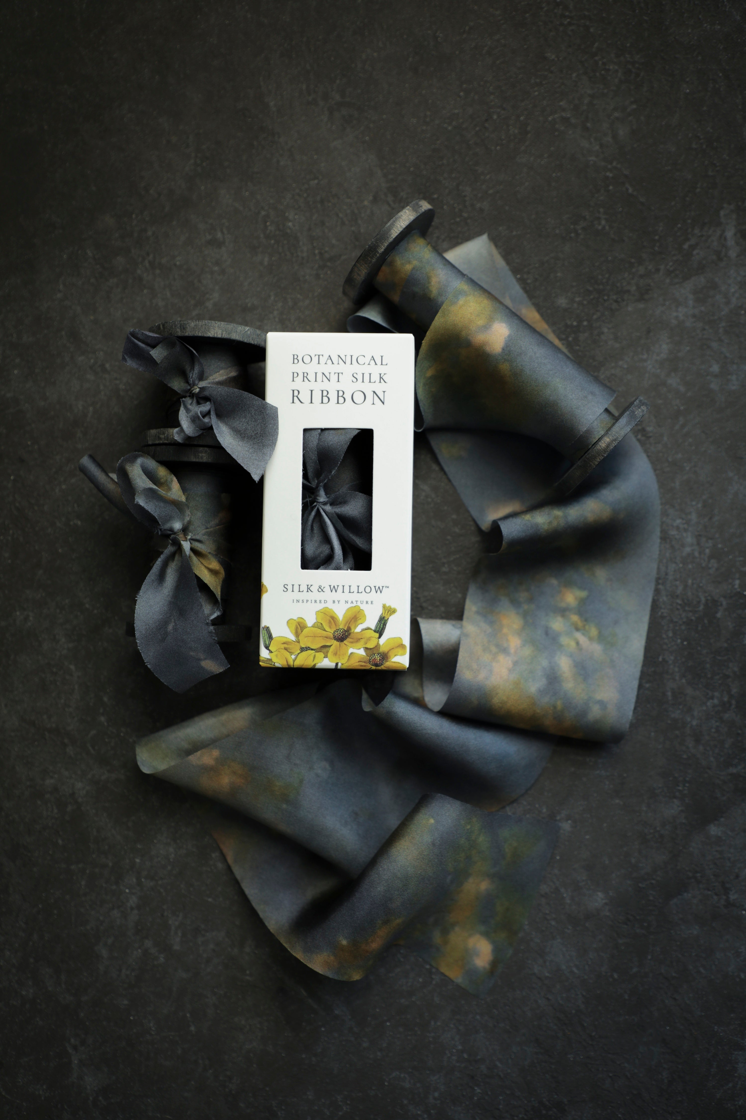 Eco-friendly silk ribbons with nature-inspired patterns, perfect for unique gift wrapping and tying market bouquets, crafted from sustainable materials