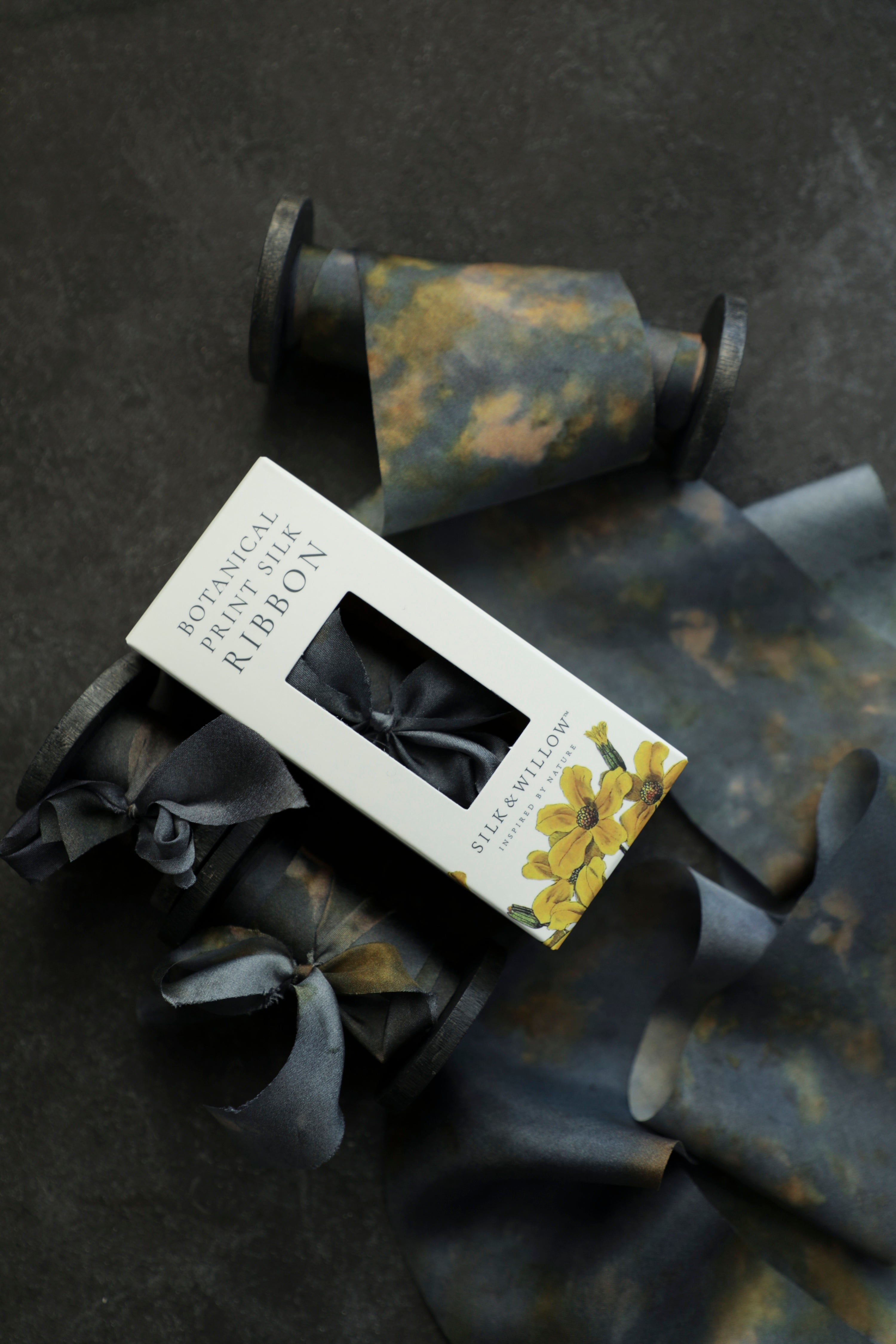 Eco-friendly silk ribbons with nature-inspired patterns, perfect for unique gift wrapping and tying market bouquets, crafted from sustainable materials