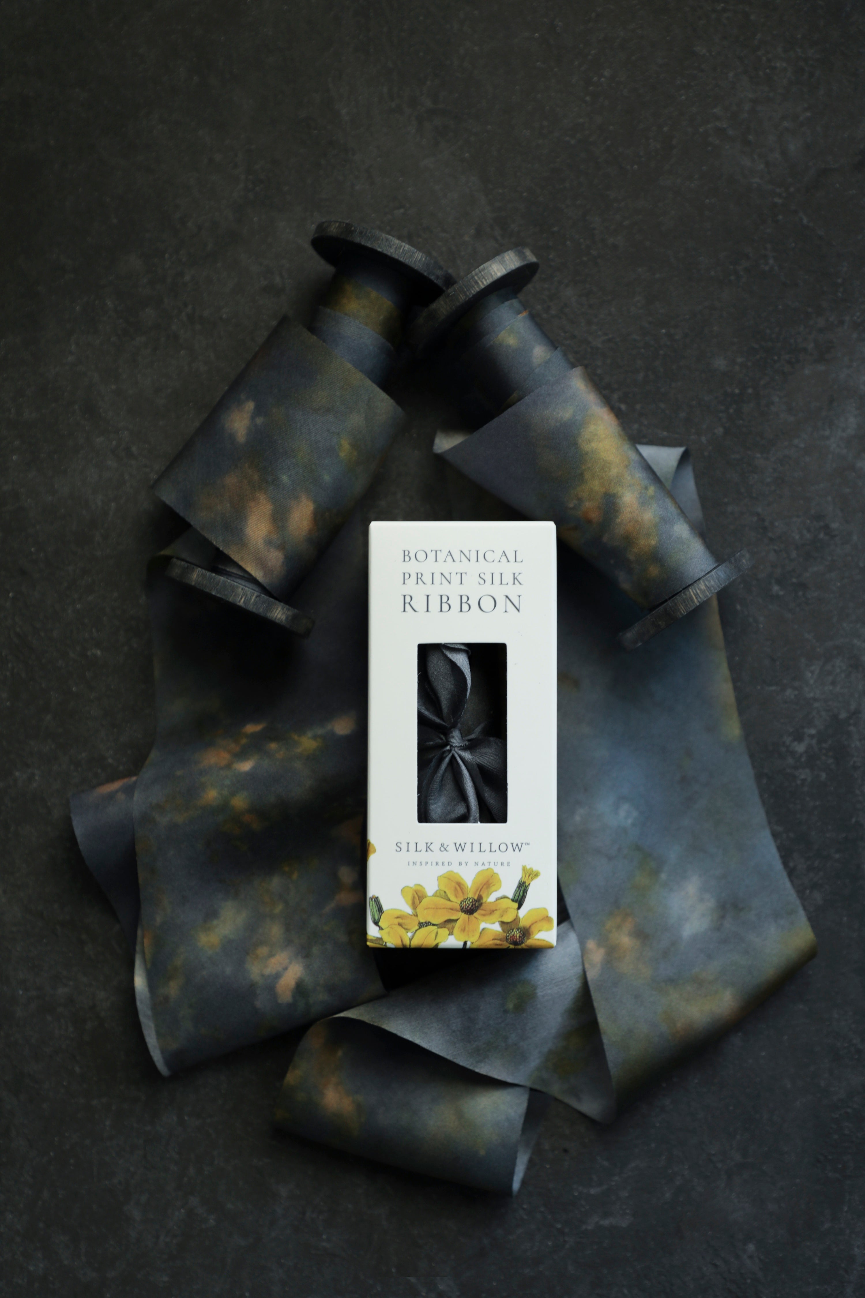 Eco-friendly silk ribbons with nature-inspired patterns, perfect for unique gift wrapping and tying market bouquets, crafted from sustainable materials