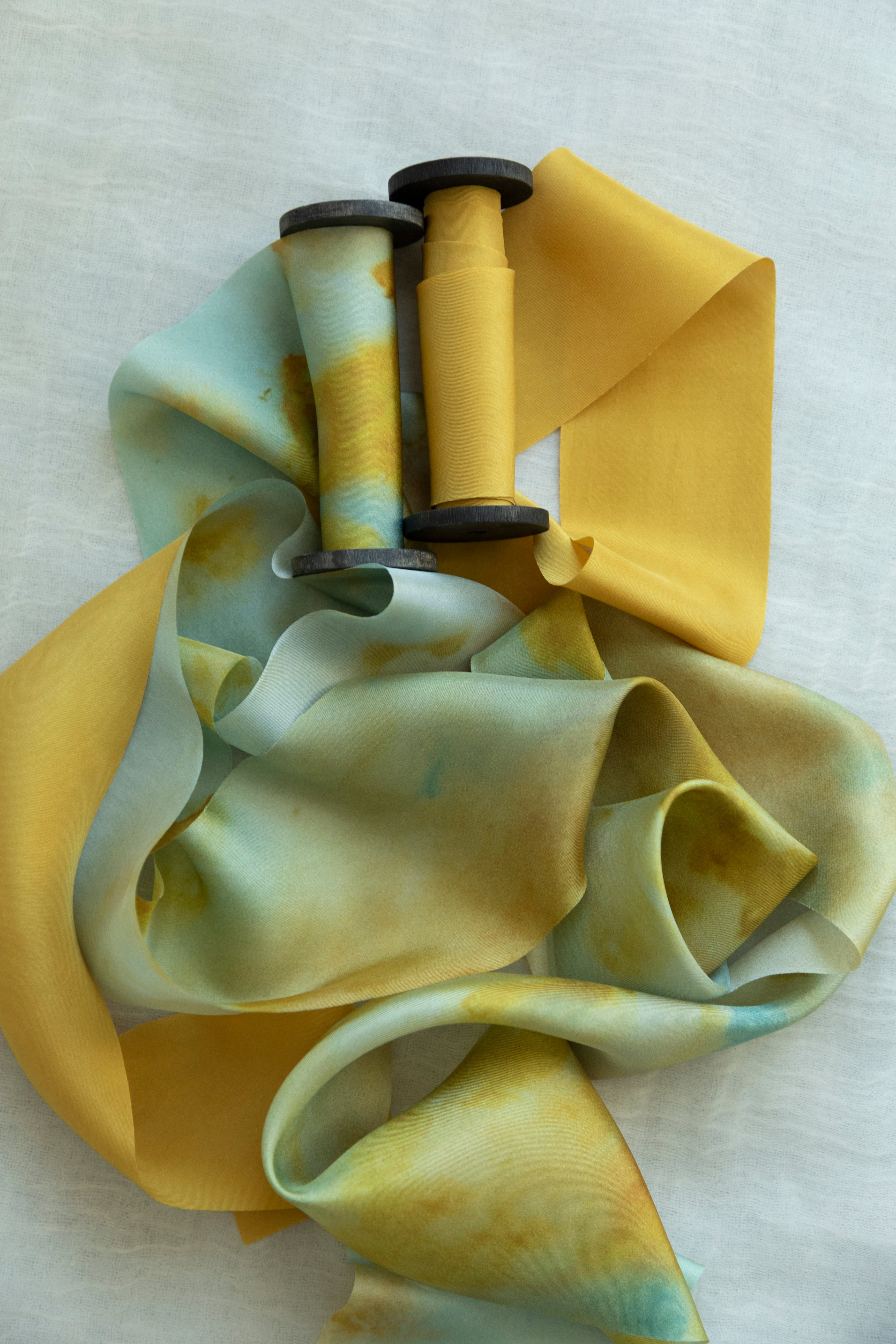 Eco-friendly silk ribbons with nature-inspired patterns, perfect for unique gift wrapping and tying market bouquets, crafted from sustainable materials