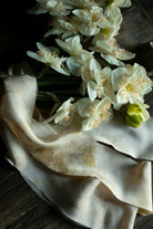 White flowers on a white fabric background