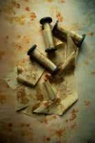 botanical print hand-dyed ribbon in gold and amber hues