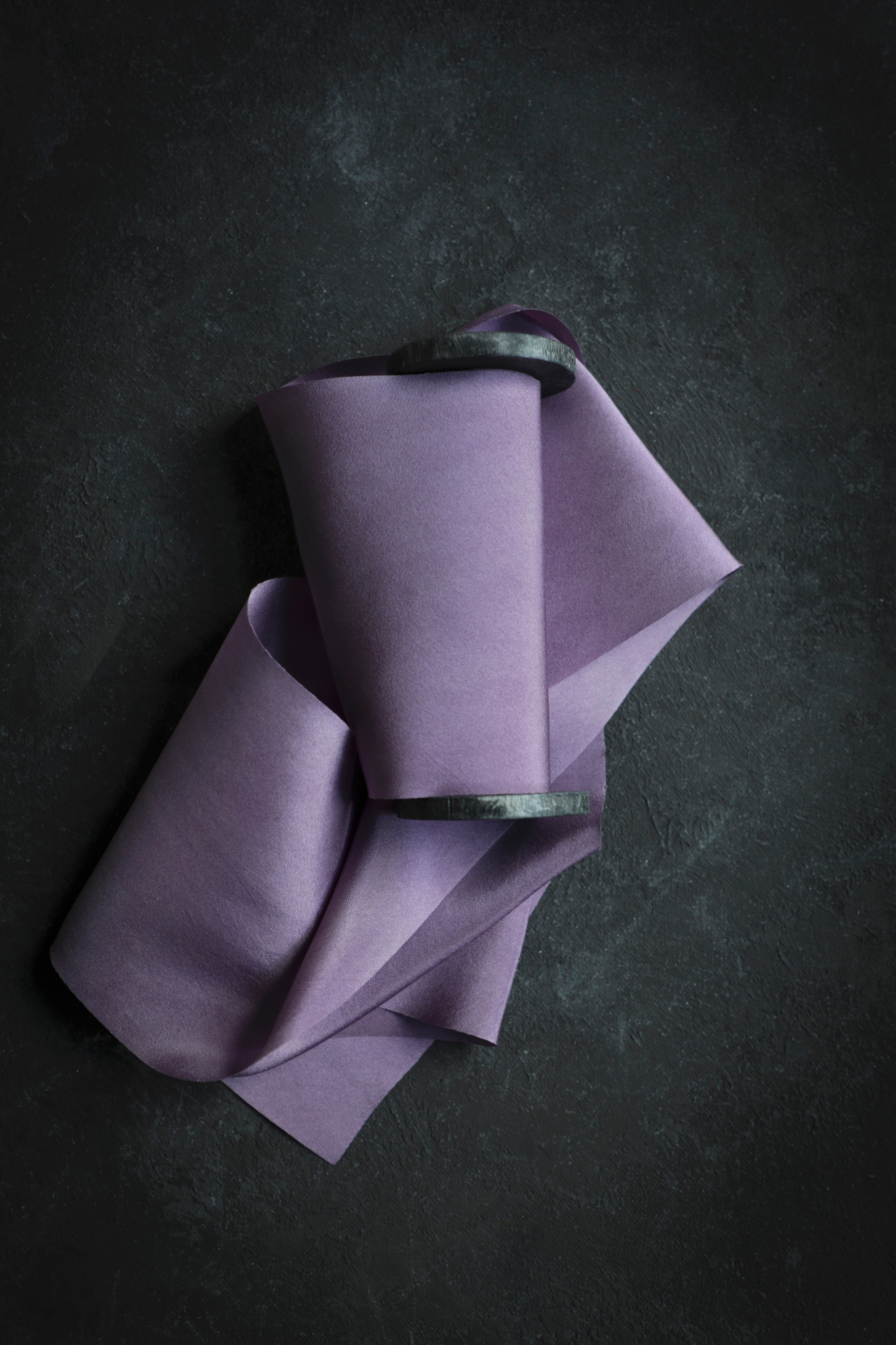 lilac color silk ribbon on black background