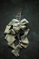 luxury gifting wrapping with silk and willow woodgrain walnut silk ribbons. Gift wrapping ideas for men. 