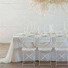 wedding table setting with monochromatic white table decor