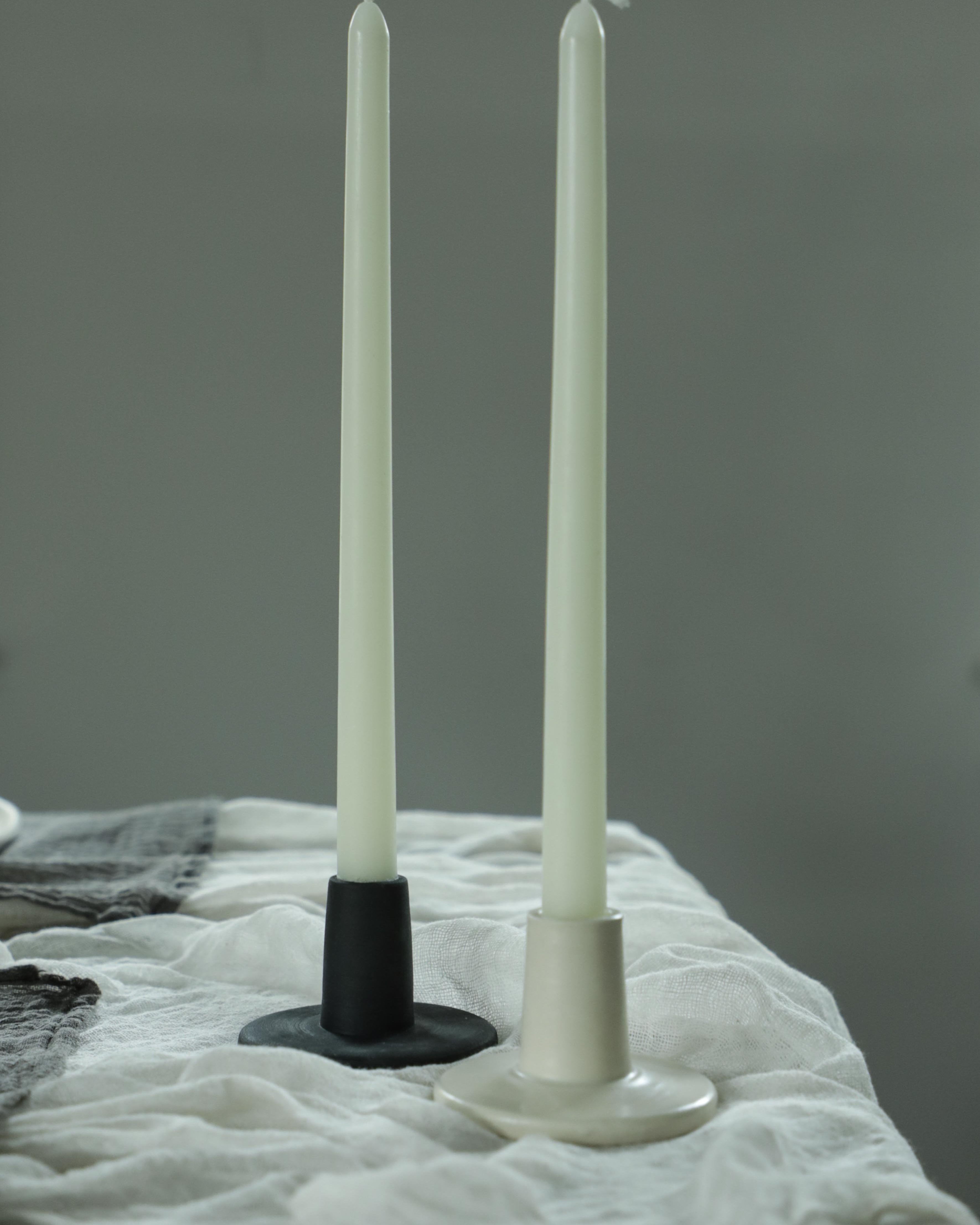 matte black and satin white candle holders with beeswax candles