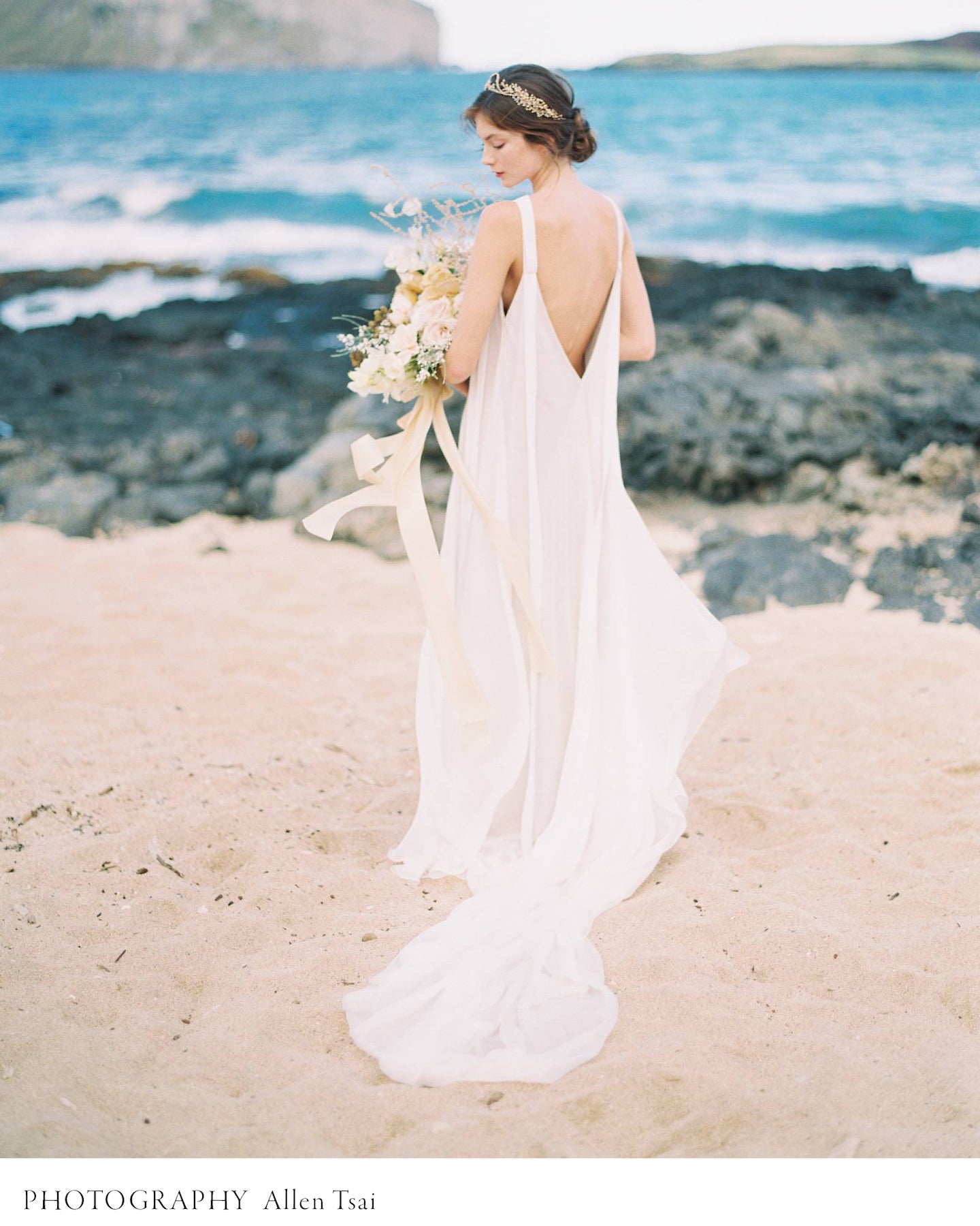 coastal elopement with bride holding a bridal bouquet with flowing silk ribbon. Featured on Magnolia Rouge Wedding blog.