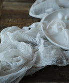 close-up of the texture of silk and willow white table runner