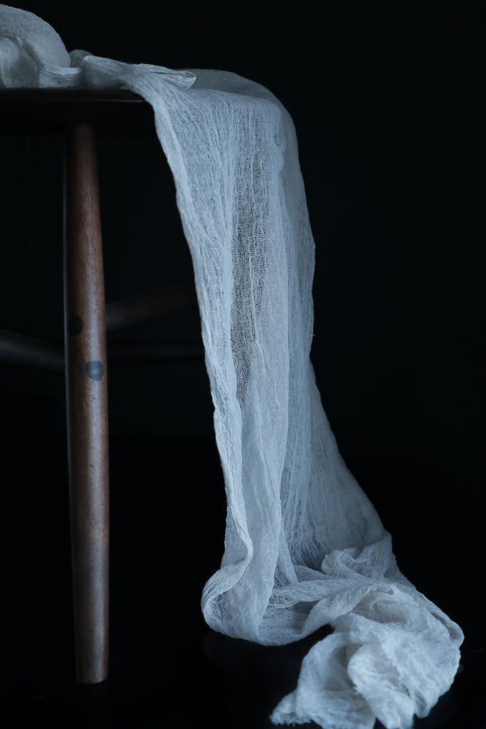 silk and willow white fabric draped on a Sawkille Co. wooden stool