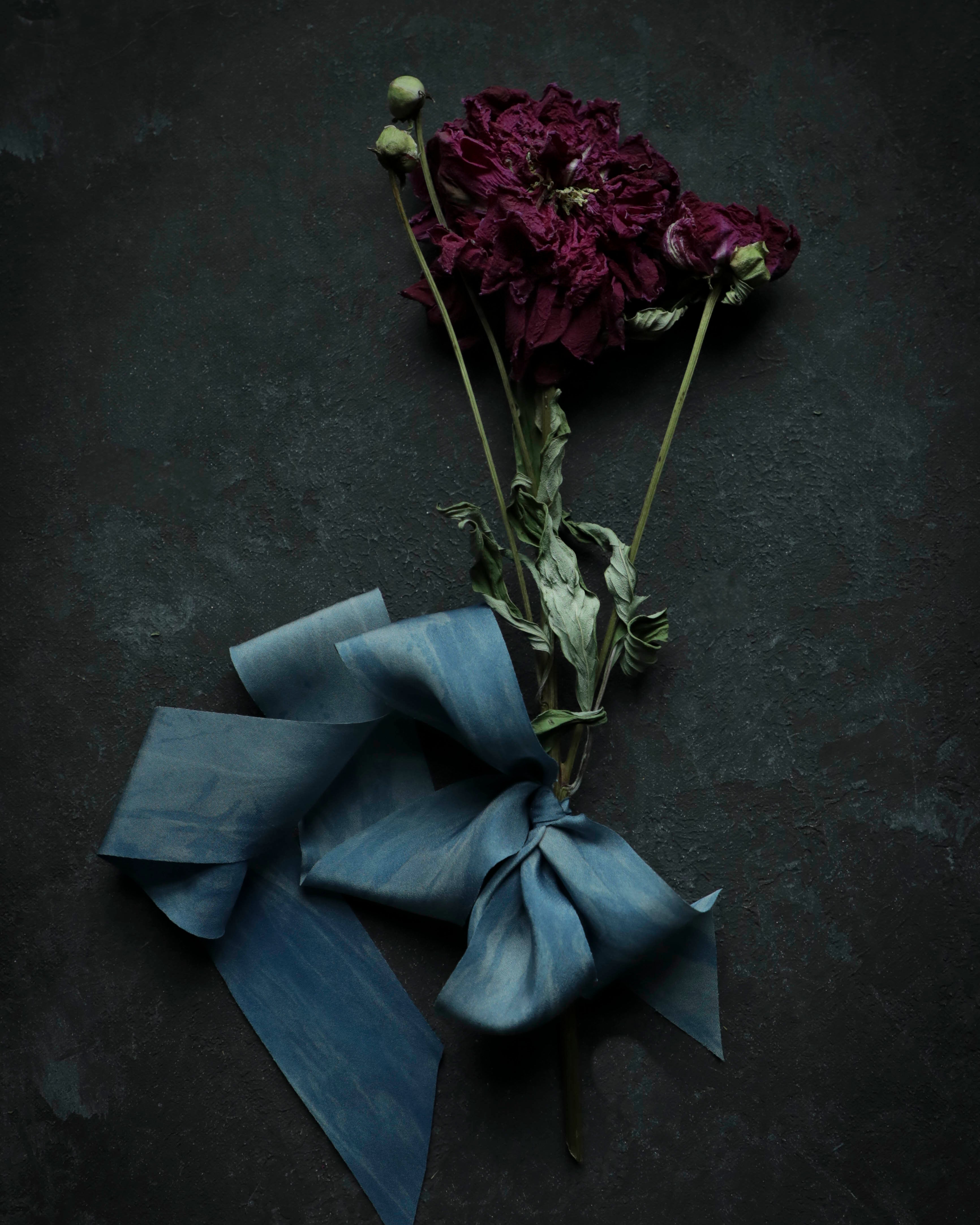 dried peony flowers tied with silk and willow plant dyed silk ribbon
