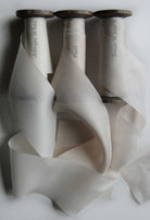 Silk and Willow classic white silk ribbons. Colors displayed are antique white, pearl white, and tussar white