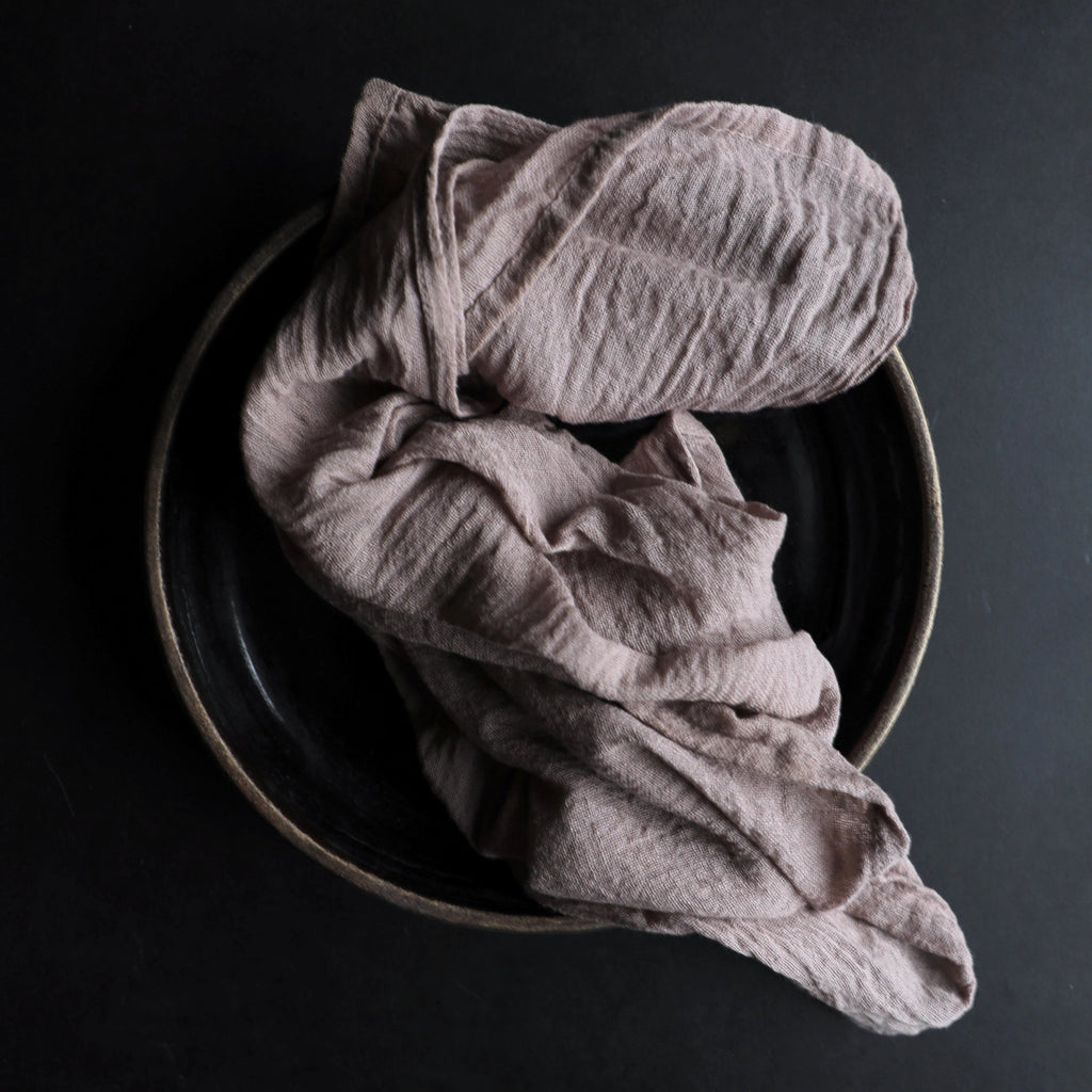 naturally dyed and hand-loomed cotton napkins for bespoke event table setting. Made by Silk and Willow
